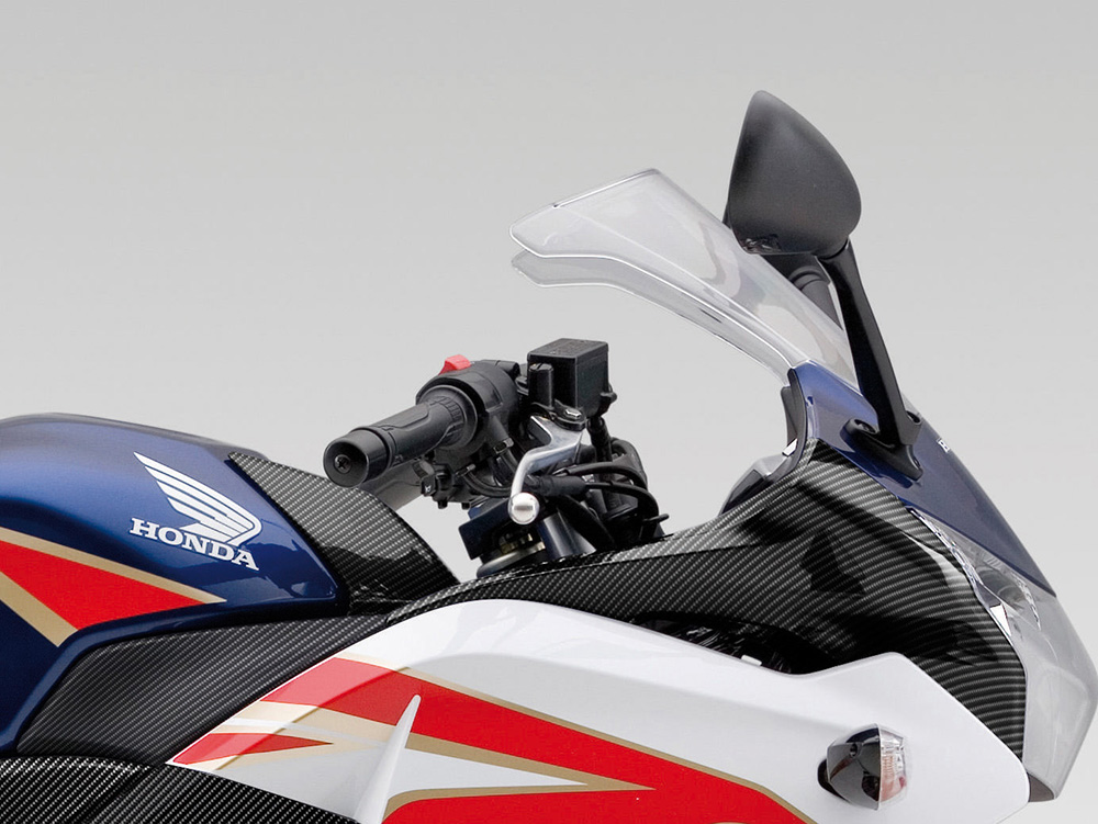 Original Honda CBR125R tank cover, carbon look